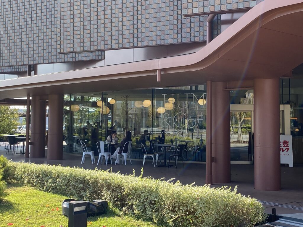A cafeteria attached to the library, with outdoor tables.